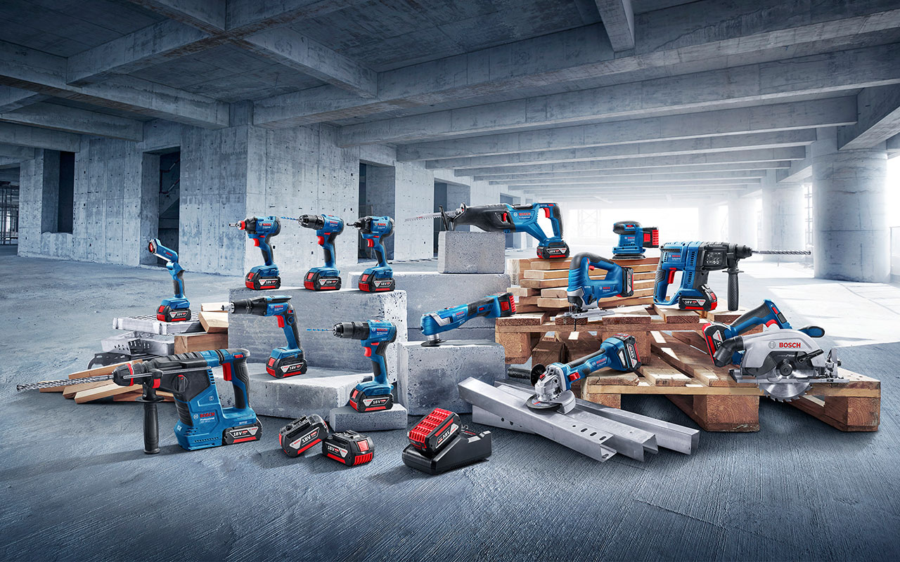 Bosch Professional tools on wooden pallets in a construction environment.