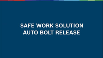 A blue background with the text "SAFE WORK SOLUTION AUTO BOLT RELEASE".