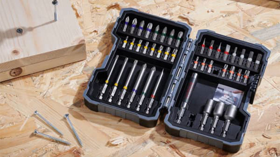An open Bosch Professional tool set with various bits and screws.