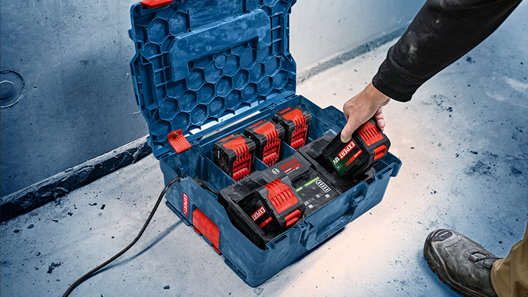 +6 An open Bosch Professional toolbox with batteries and charger.
