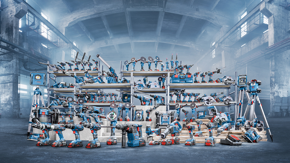Range Professional 18V System  Diverse blue Bosch Professional tools on shelves in a hall.