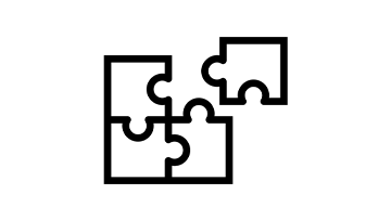 Black puzzle pieces lie on a white background.